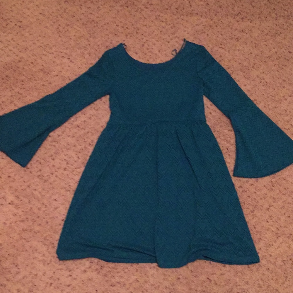 A teal kids dress